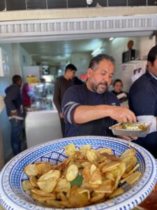 ترتبط كلمة «كفتاجي» على الأرجح بالكلمة التركية köfteci، أي بائع الكفتة أو صانعها.